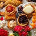 Platter of fresh pastries and fruit for breakfast
